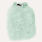 Light green fuzzy sweater with 'Christian Cowan' label on a white background