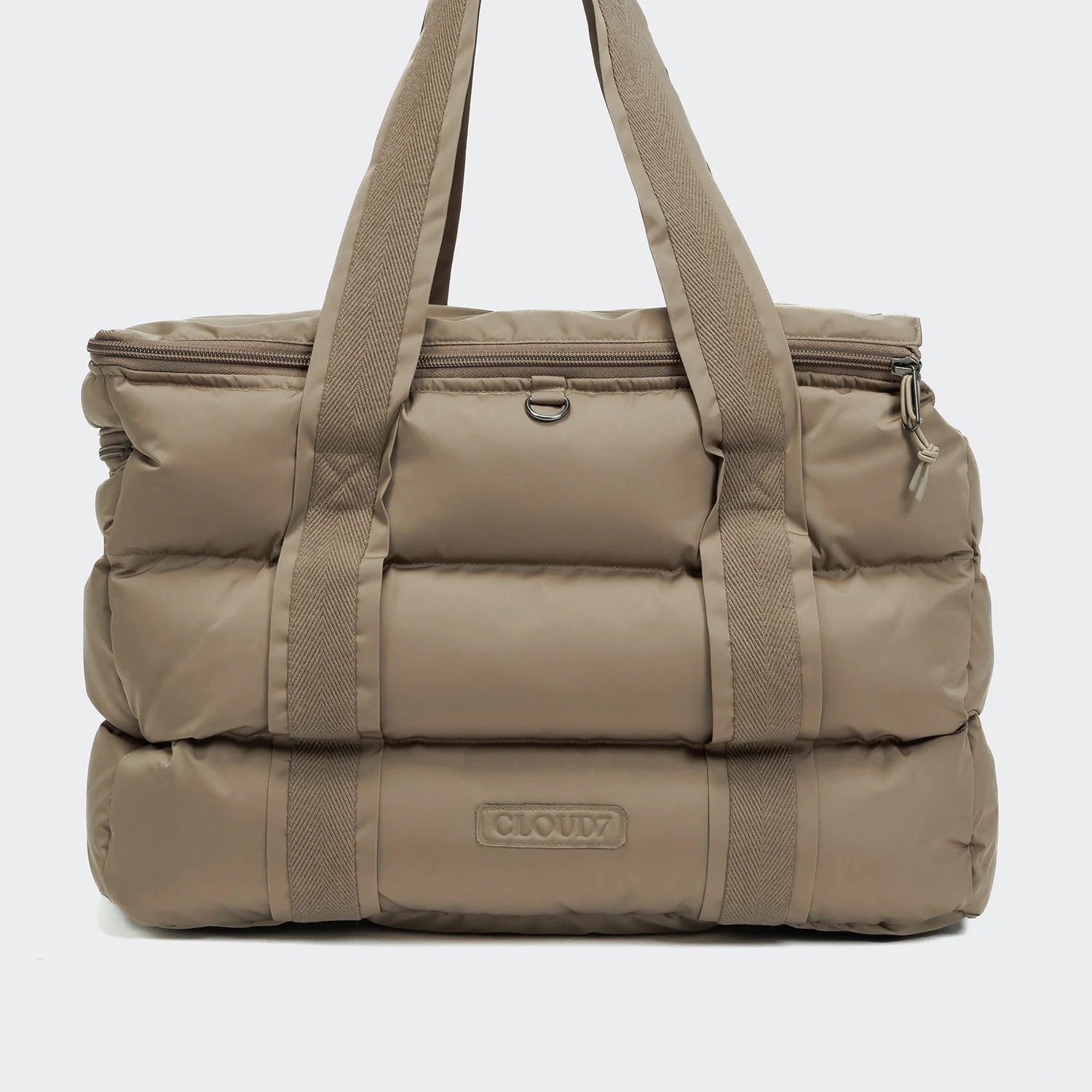 Premium dog travel carrier in sandy brown with practical storage pockets