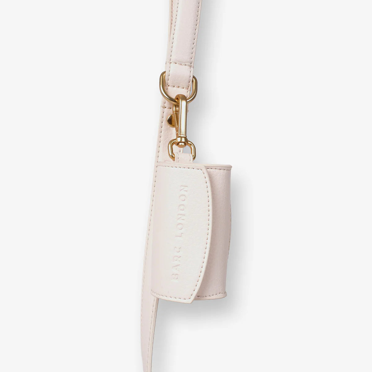 White leather strap with gold hardware on a white background