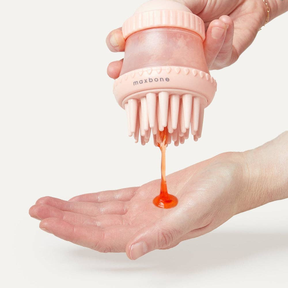 Silicone dog grooming brush with shampoo dispenser