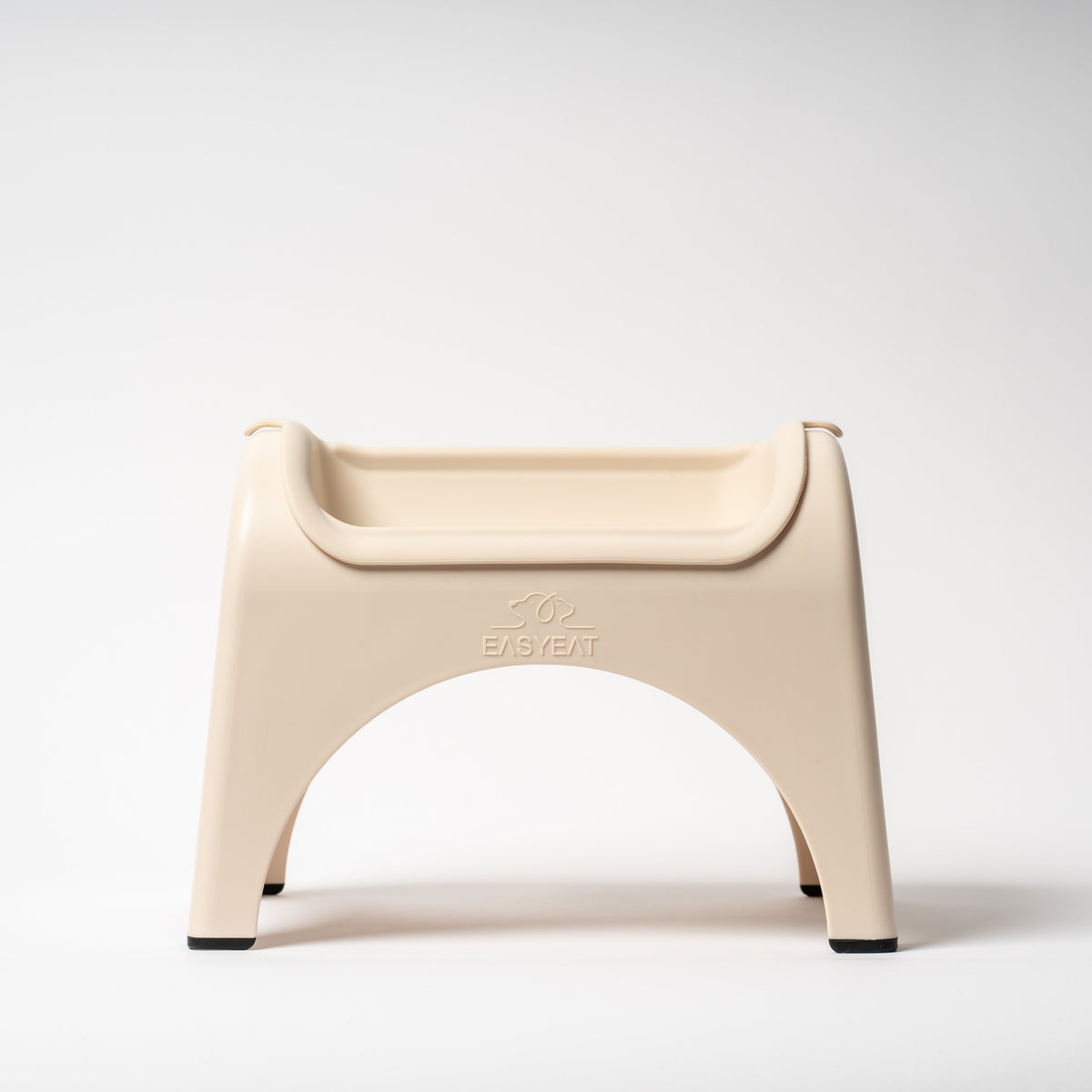 Beige plastic stool on a white background