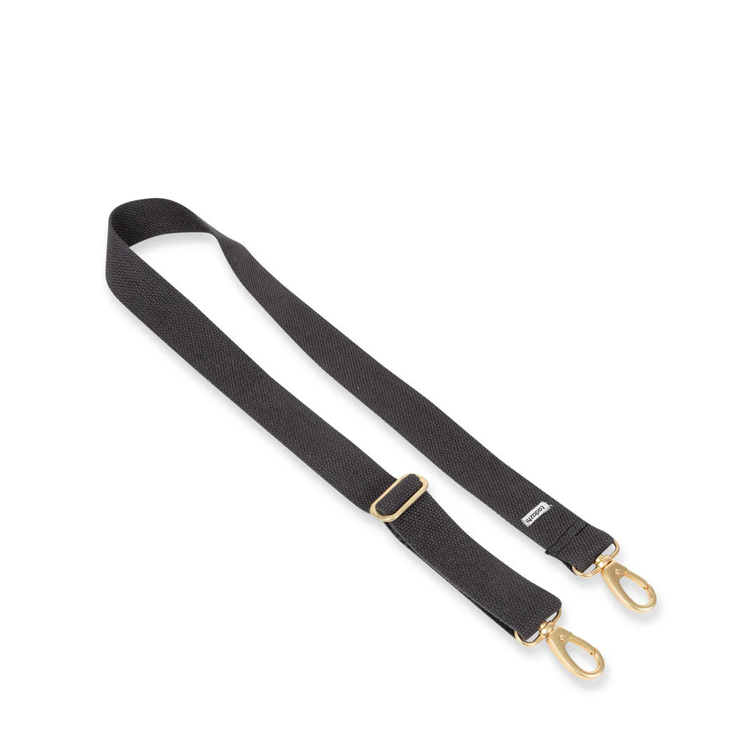 Black strap with gold hardware on a white background
