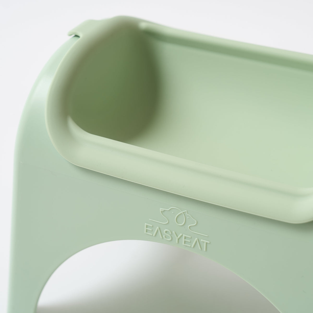 Light green silicone baby seat with 'EASYEAT' branding on a white background