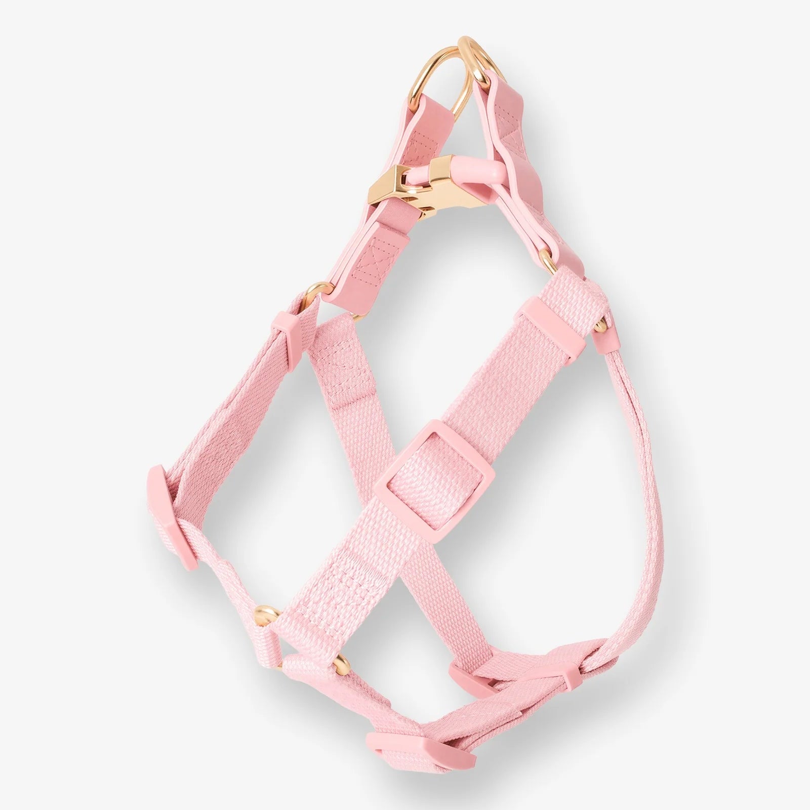 Pink dog harness on a white background