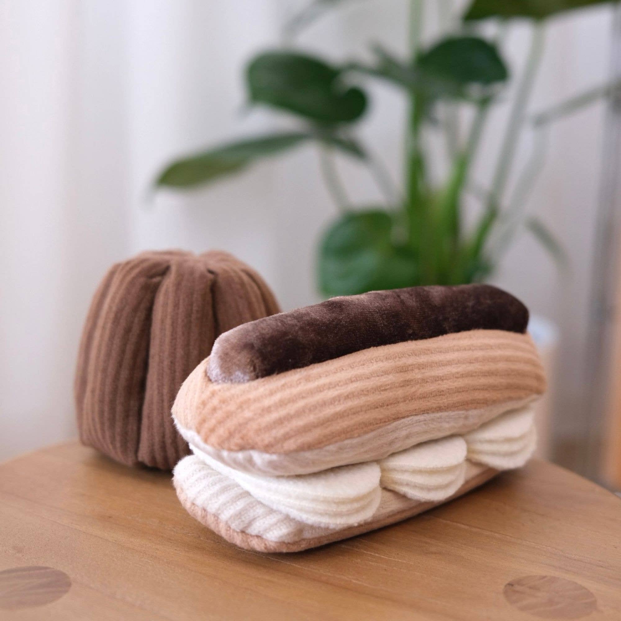 Hidden treat pockets inside the Lambwolf Collective Eclair Dog Toy