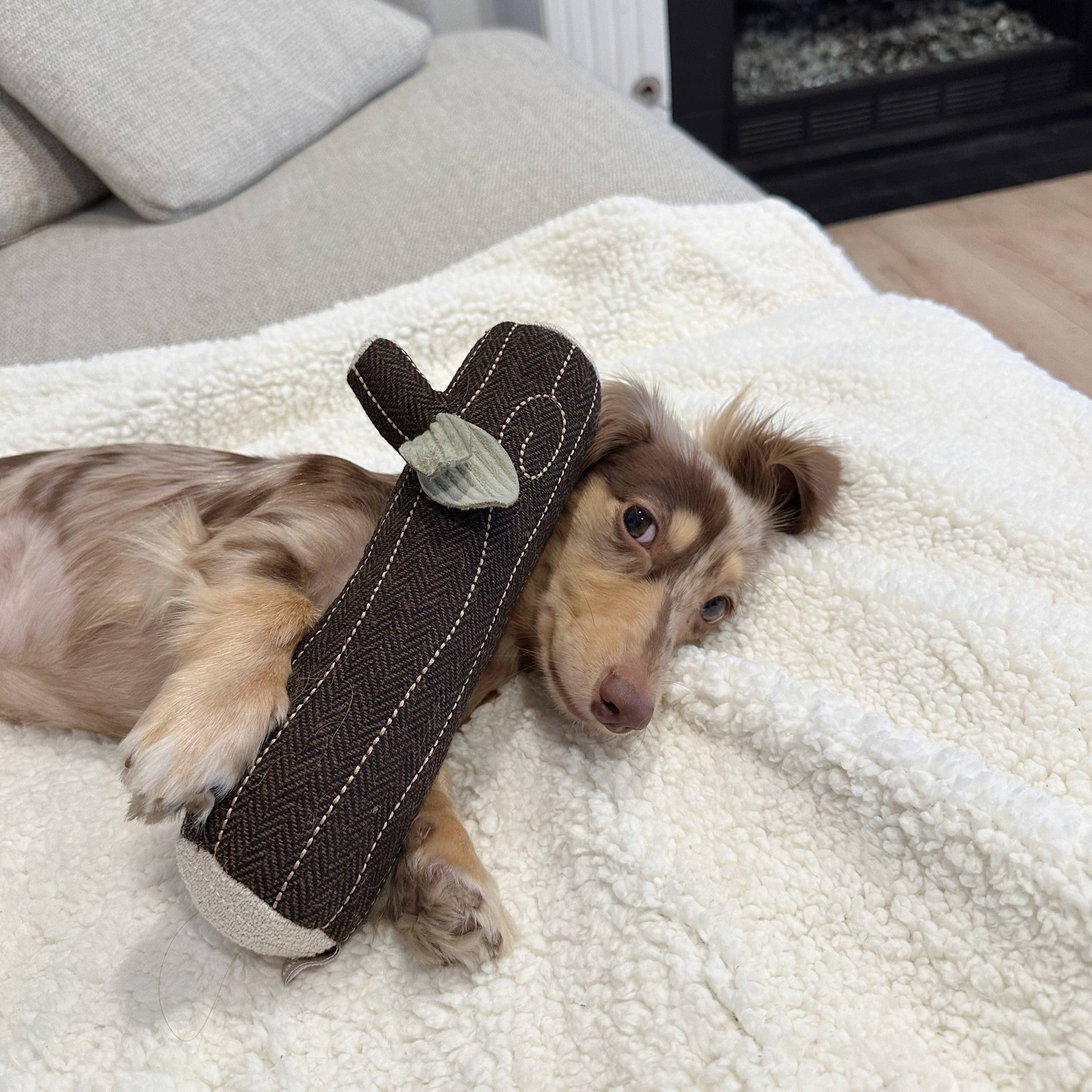 Herringbone fabric detail on the Fire Log Dog Toy