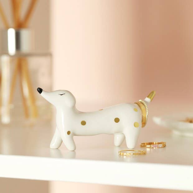 Close-up of the ceramic sausage dog ring holder