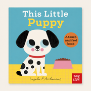 Book cover of 'This Little Puppy' with a cartoon dog and colorful design.