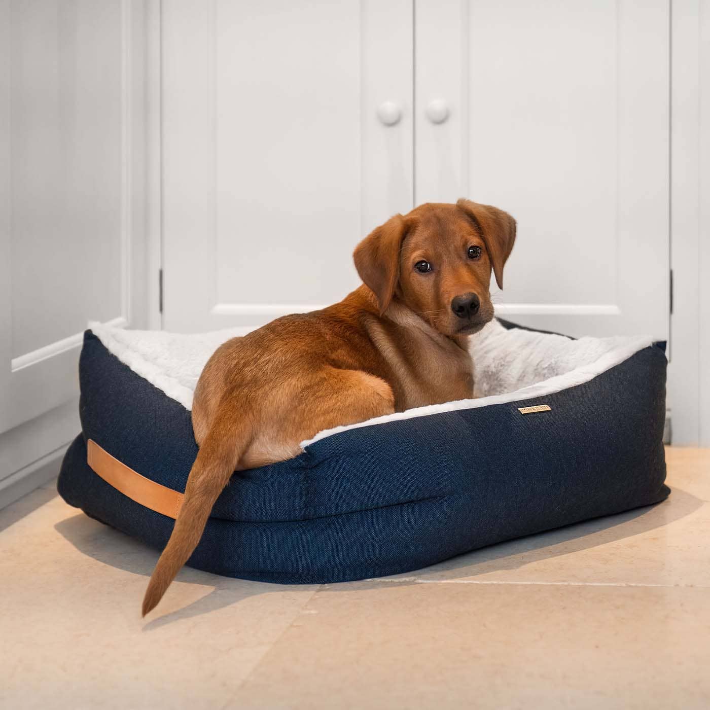 Raised padded side walls on the Essentials Twill Box Bed in Denim