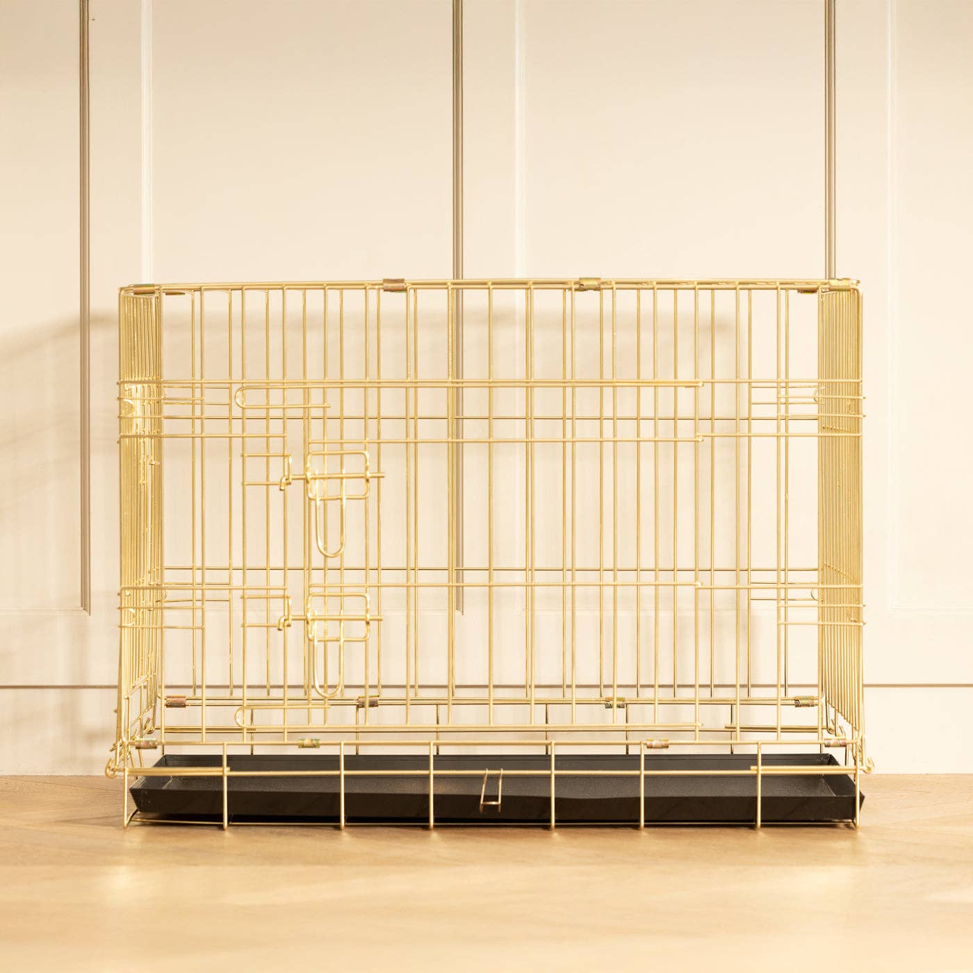 Heavy-duty latch detail on the Champagne Gold dog crate