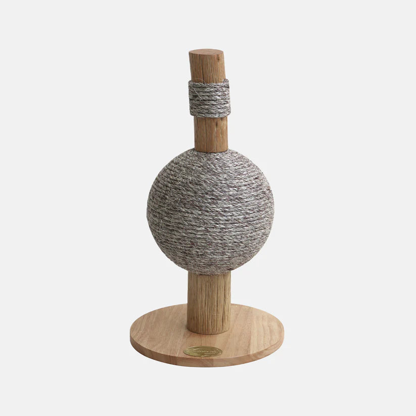 Cat toy with a spherical rope ball and wooden base on a white background