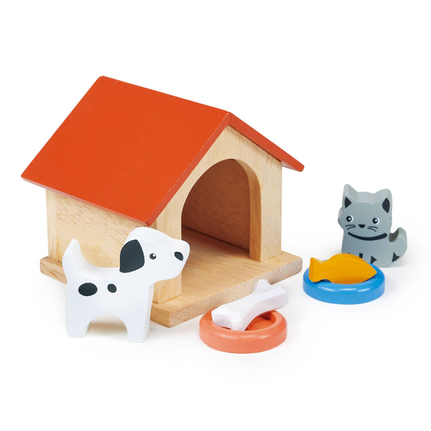 Wooden doghouse with toy dog, cat, and fish on a white background