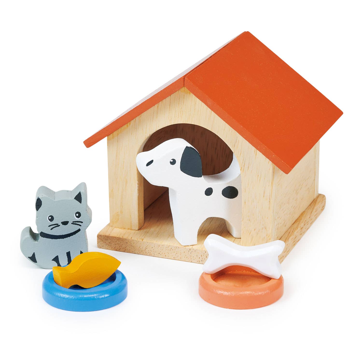 Wooden toy doghouse with a dog, cat, fish, and bone on a white background