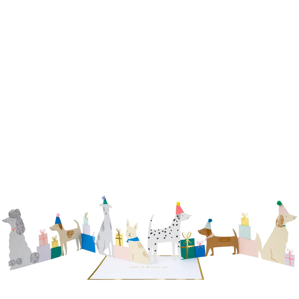 Greeting card with illustrated dogs and party hats on a white background