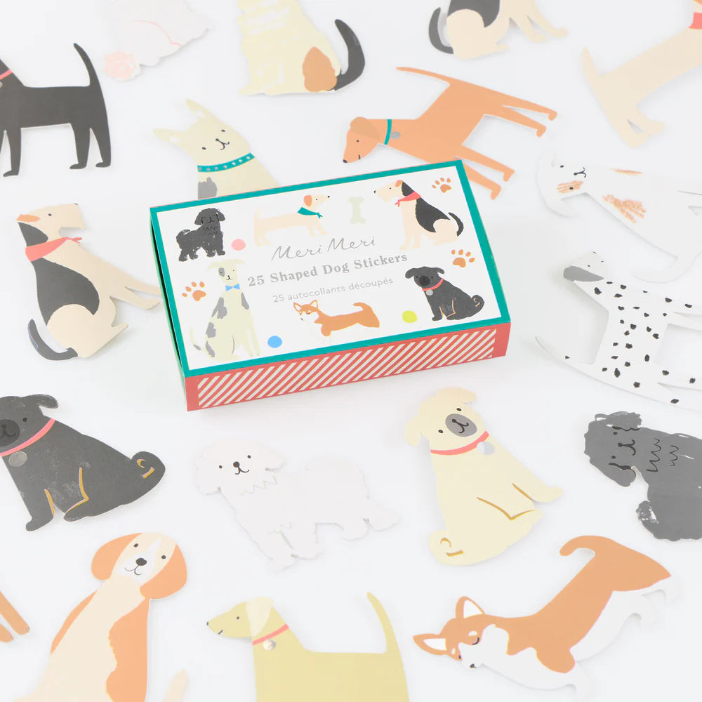 Box of dog-shaped stickers with various dog illustrations on a white background