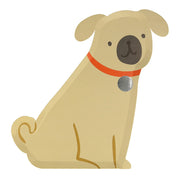 Beige dog figurine with a red collar and silver tag on a white background