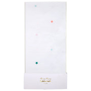 White tablecloth with colorful star patterns on a white background