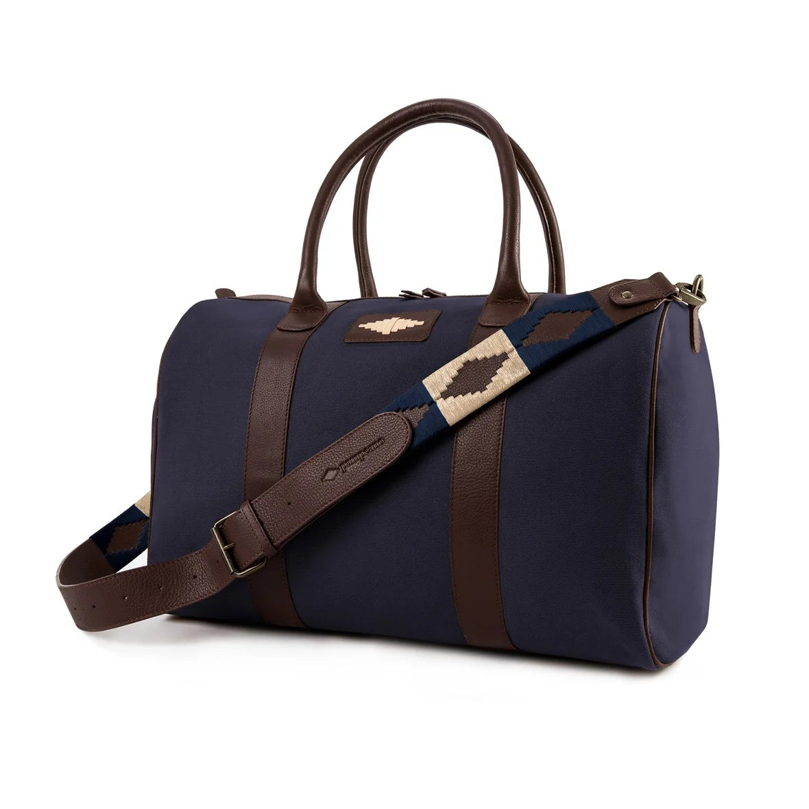 Navy canvas pampeano Varon travel bag with brown vegetable-tanned leather