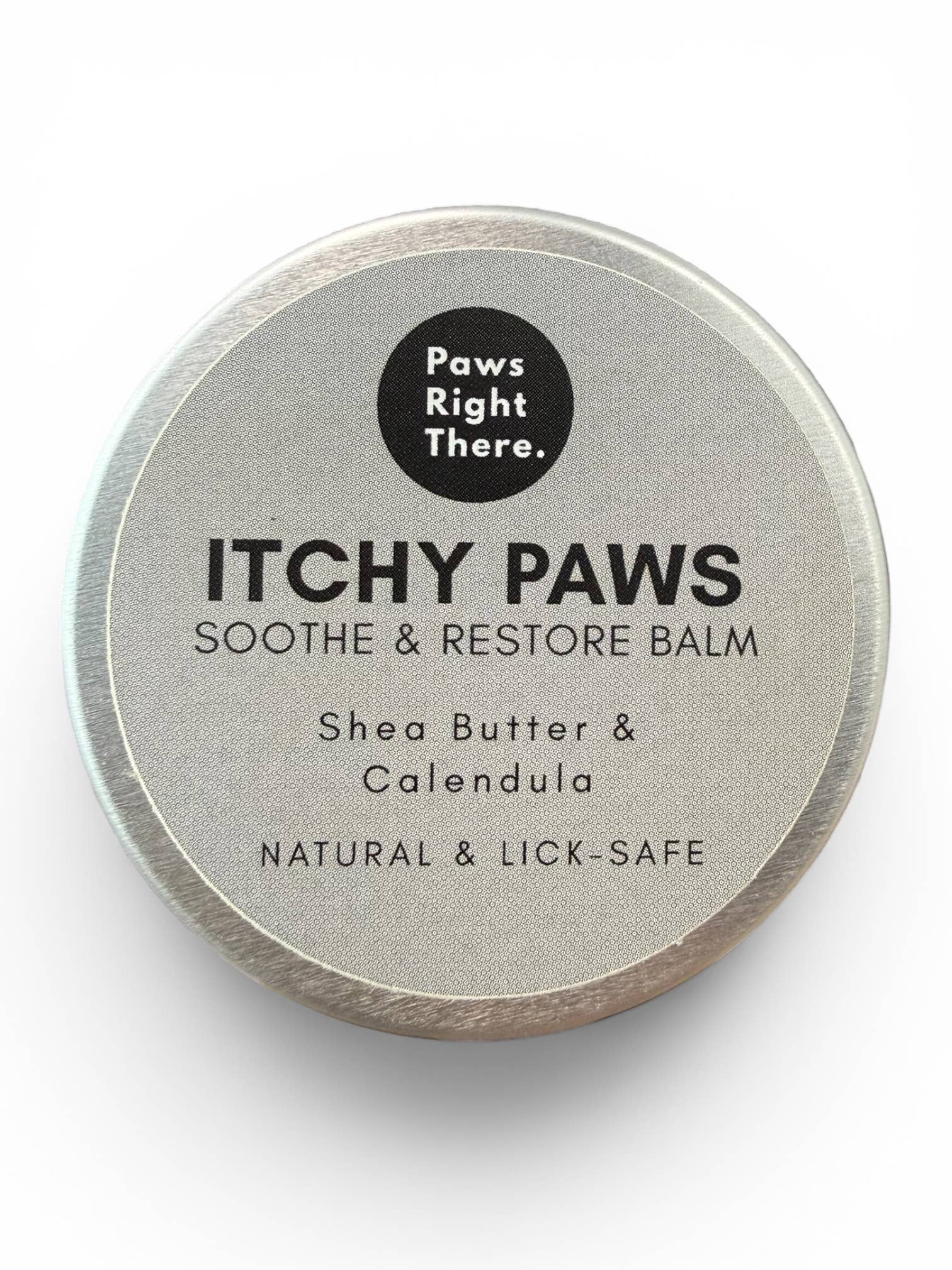 Balm container labeled 'Itchy Paws' with 'Paws Right There' branding on a white background