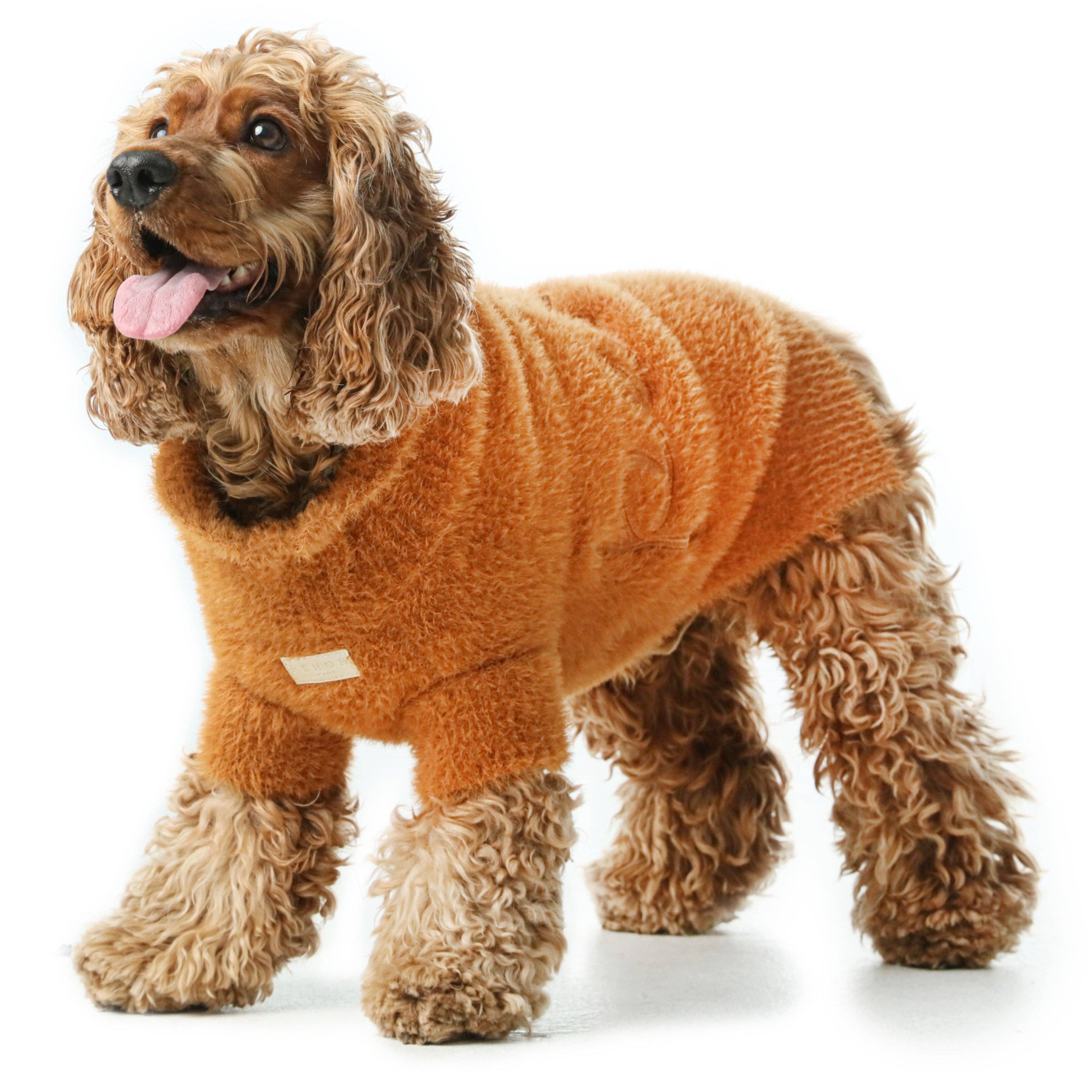 Dog wearing the Eskimo Fuzzy Sweater in Orange