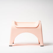 Pink stool on a white background