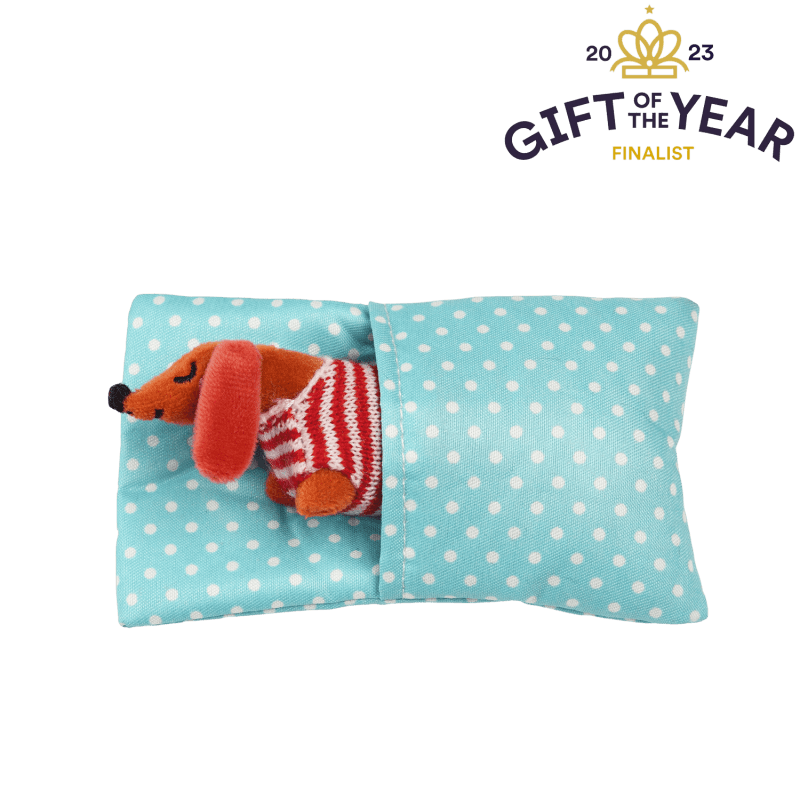 Cute sausage dog plush toy with polka dot blanket and striped jumper