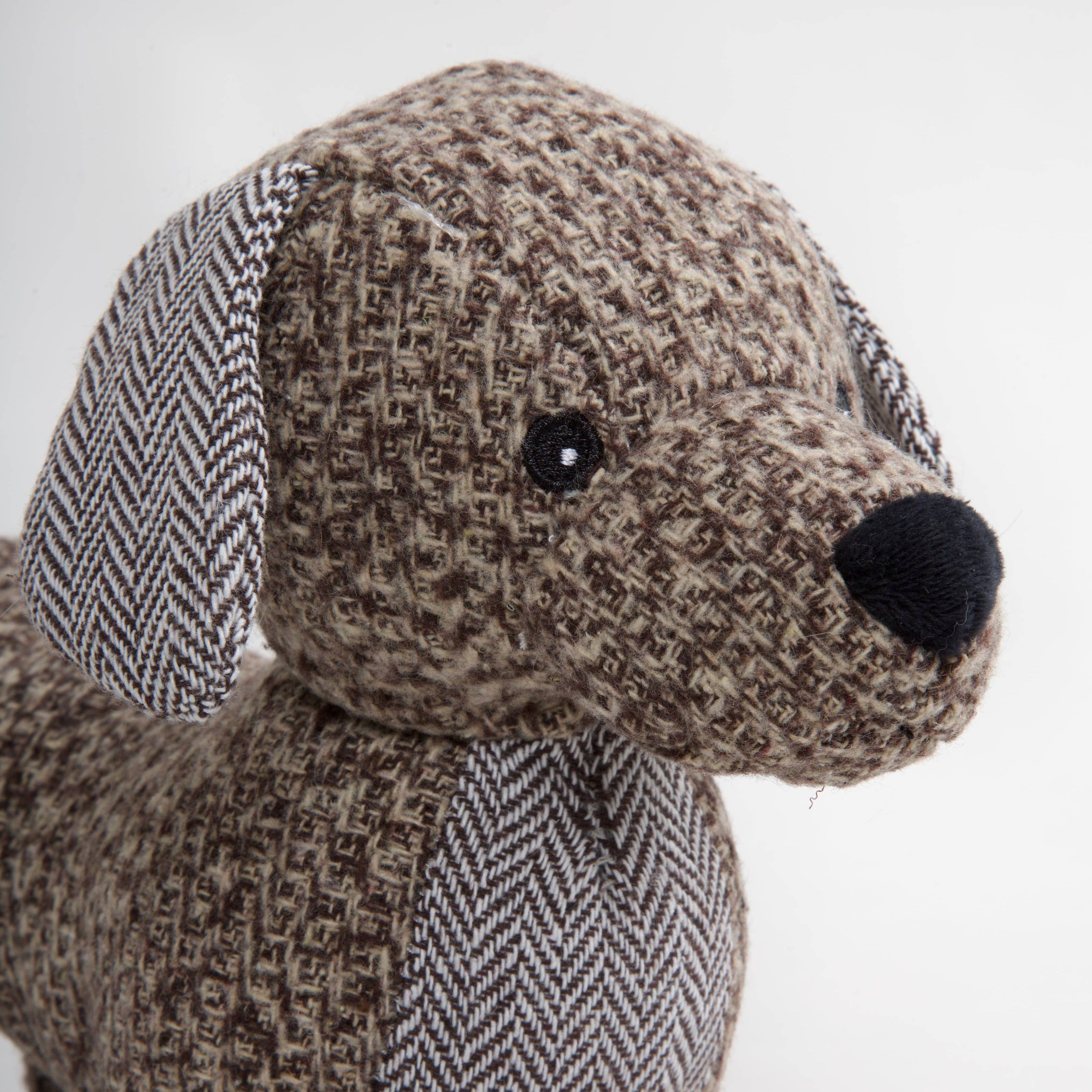 Soft dachshund dog toy with textured fabric finish