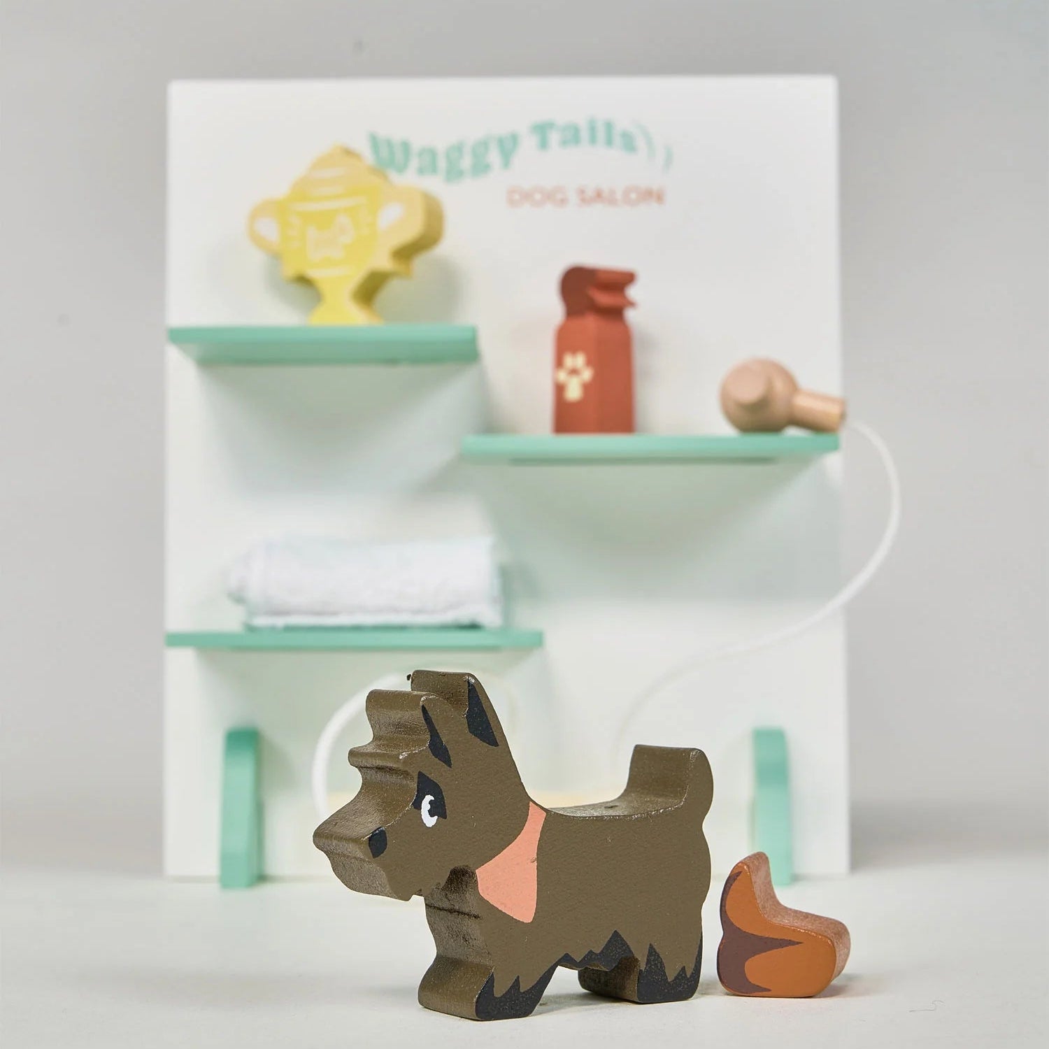 Wooden grooming station inside the Waggy Tails Dog Salon play set