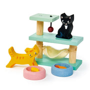 Wooden cat play set with multiple levels, toys, and figurines on a white background